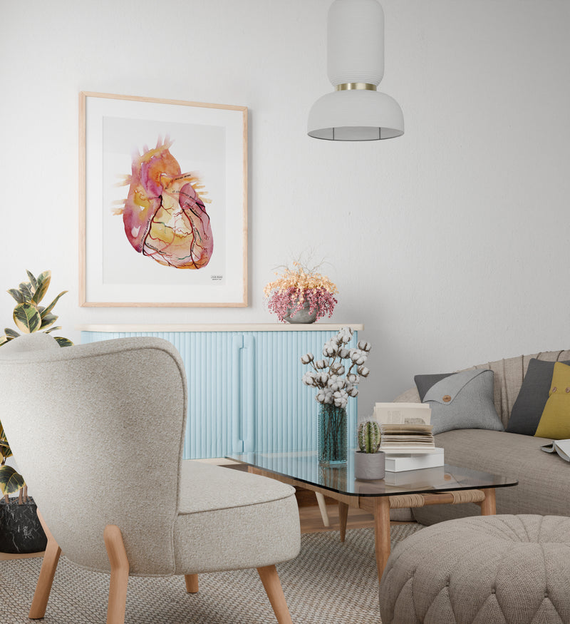 heart anatomy art with coronary arteries labeled in a doctor office waiting room