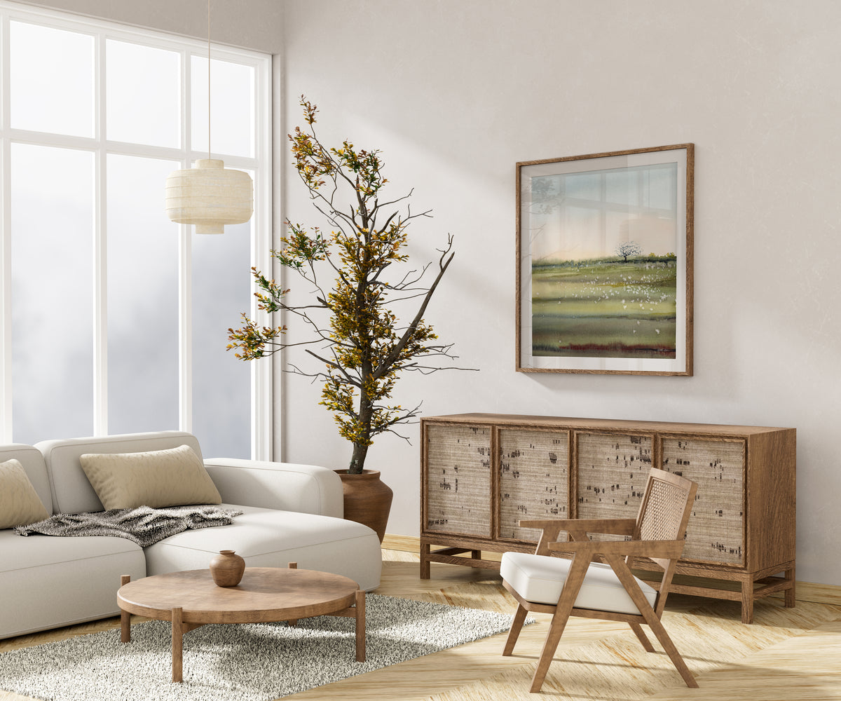 painting of a landscape that has anatomy in it in a doctor's office or med student room