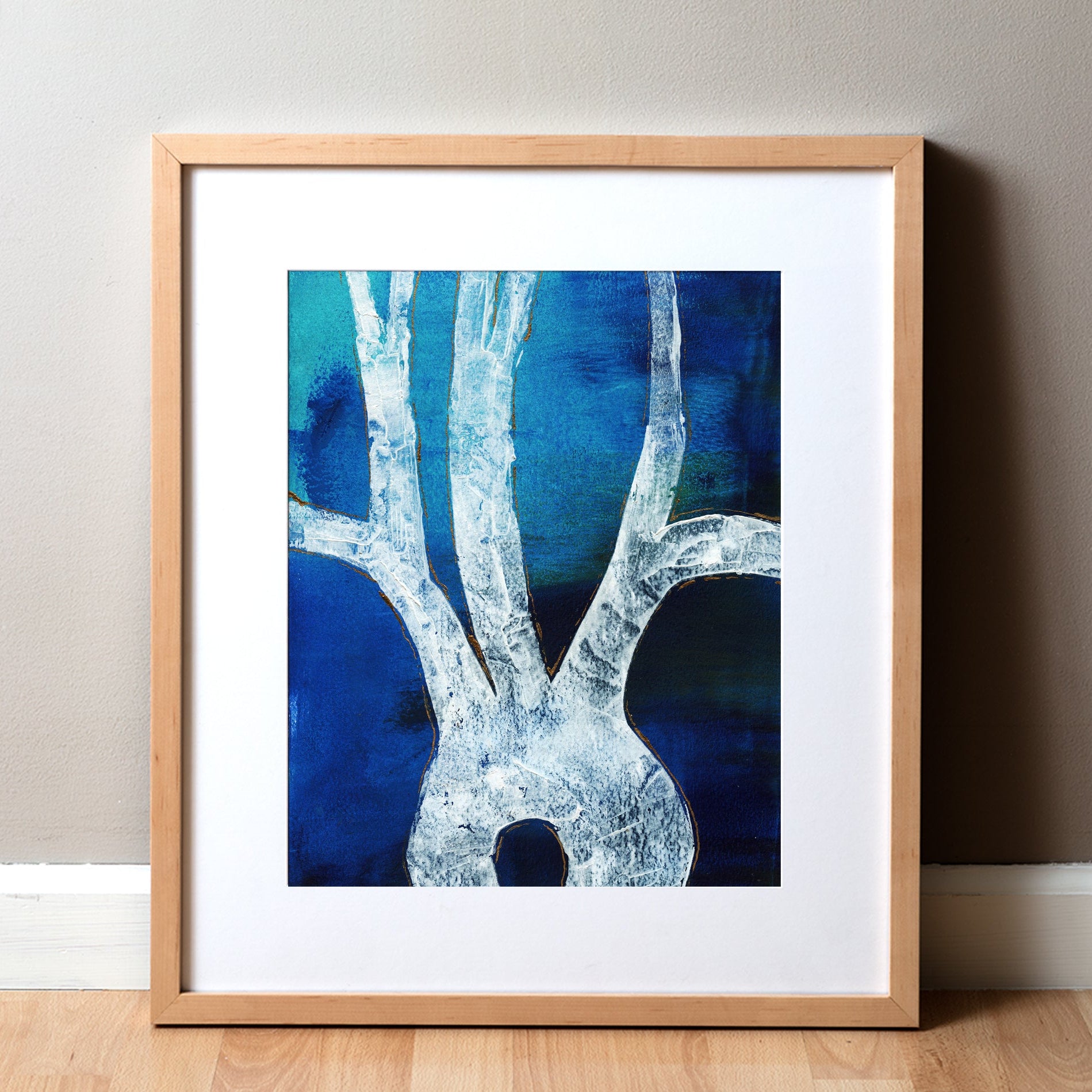 Framed abstract art print of an aorta that comes off the heart with blue and white design on a neutral wall.