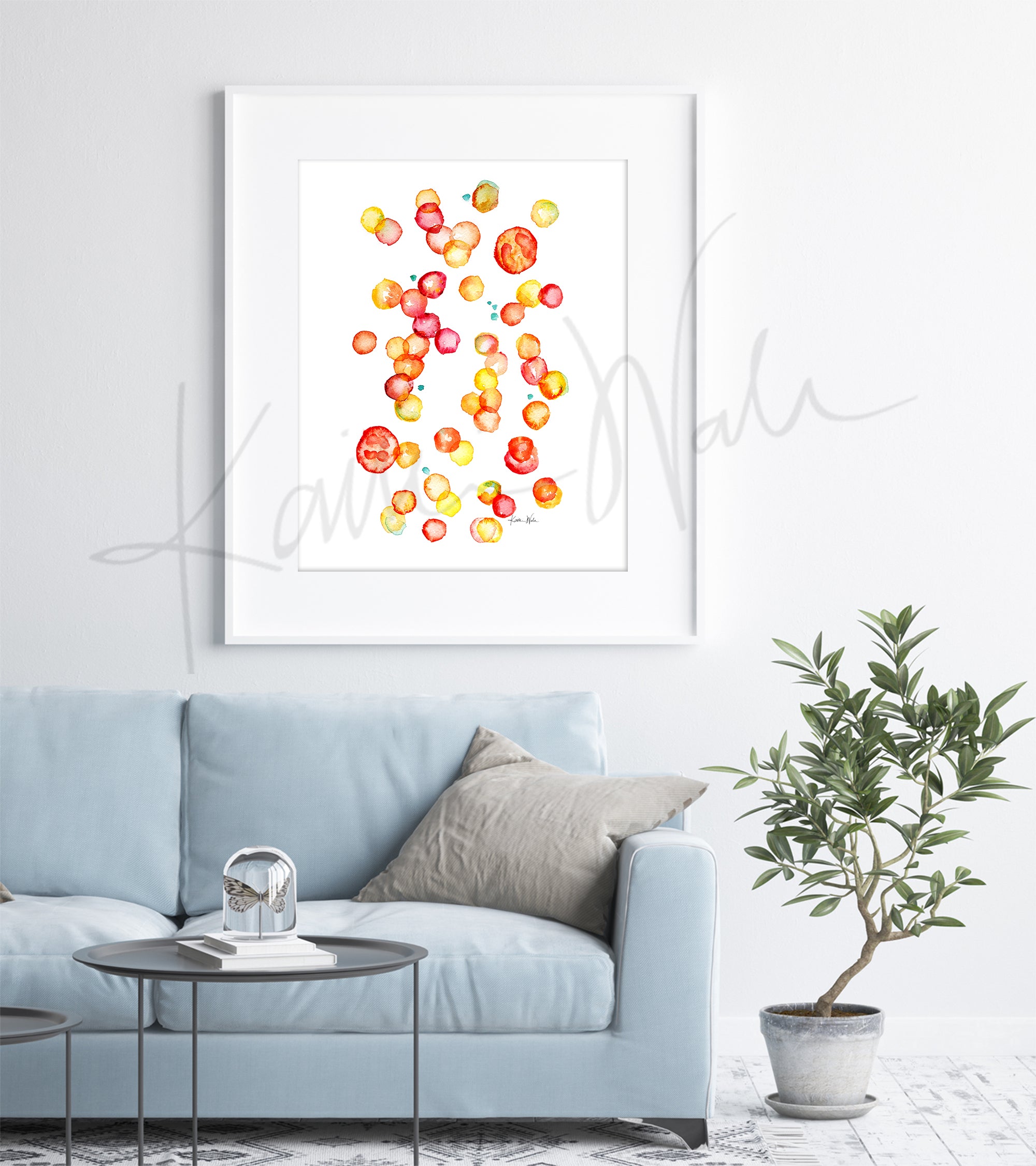 Framed watercolor print of red blood cells in a doctor's office